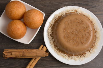 Natilla and buñuelos traditional colombian food.
