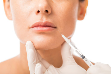 Woman Getting Cosmetic Injection On Lips