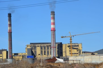 Two funnels with crane