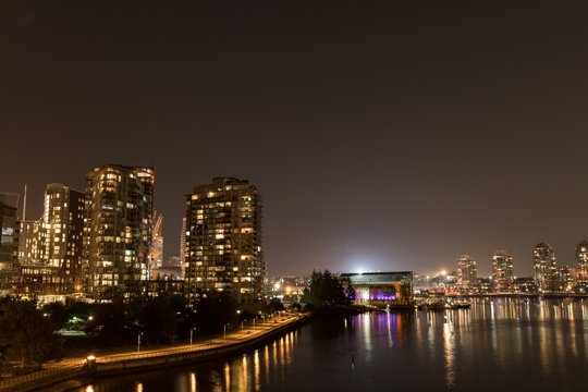 Downtown With Light Trail And River