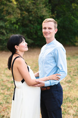 Obraz premium International young romantic couple holding hands outdoor