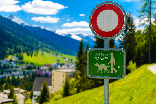 Sign Plate With A Dog In Alps Mountains, Davos,  Graubuenden, Switzerland