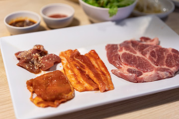 raw pork with sauce for bbq grill