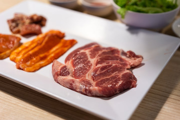 raw pork with sauce for bbq grill