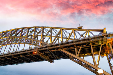 Night view of Sydney Harbor Bridge at sunset, Australia