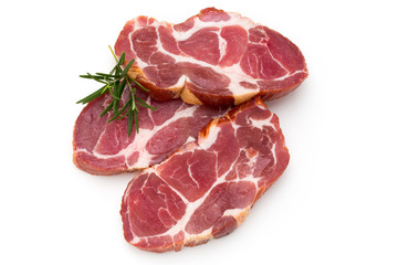 Fresh pig crude meat with rosemary.