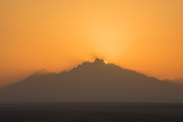 Beautiful sunset over desert mountain landscape