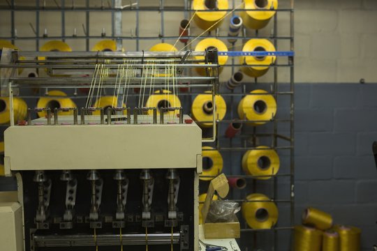 Thread roll arranged in pallet rack