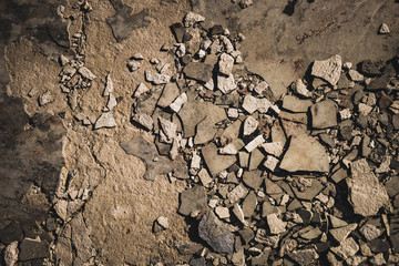 Stone background with old crumbs and splinters