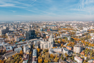 Obraz premium Aerial drone shot of Voronezh downtown with buildings from above, parks, streets with cars in sunny day