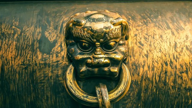 elements: Gold animal face Statue in the Forbidden City, Beijing, China. Symbol of Chinese traditional culture.The element of design.