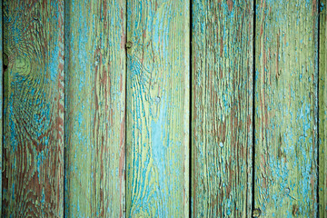 Old wooden background. Wood texture painted green closeup. Vintage wood.
