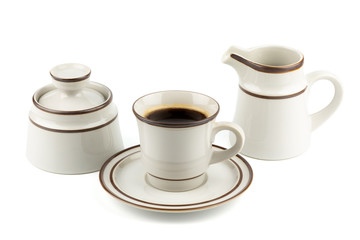 Obraz na płótnie Canvas Set of Porcelain coffee and tea with sugar bowl and milk container isolated on white background. with clipping path inside.