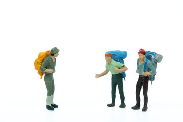 Miniature people,backpacker on white background