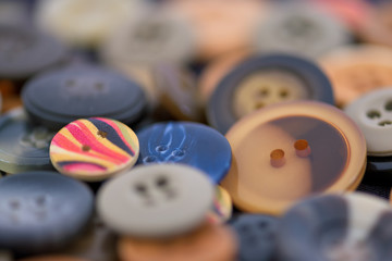 Large group of round plastic buttons