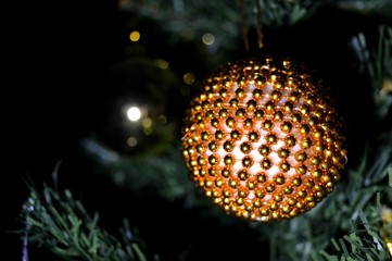 New Year's jewelry at night on a Christmas tree
