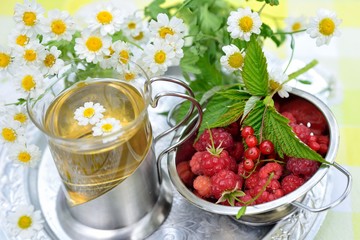 Fresh juicy berries of raspberry and currant