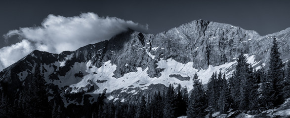 Black and white photograph of Blanca Peak, Ellingwood Point, and Little Bear Peak.  Three rugged mountains in the Sangre de Cristo range of the Colorado Rocky Mountains