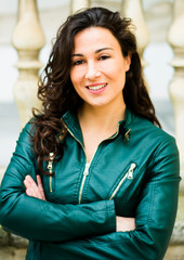Obraz premium Beautiful woman with brunette hair in the park