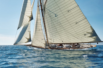 Naklejka premium Sailing ship yacht race. Yachting. Sailing. Regatta. Classic sail yachts and sailboats