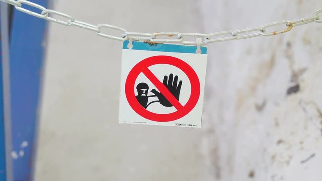 20736_A_No_Entry_sign_hanging_on_the_blue_chain_in_Leevaku_Estonia.mov