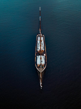 Aerial view of sailing ship in the blue ocean