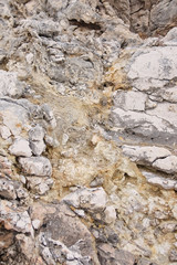 brown color natural marble with royal feel texture. cracks in the rocks on the shore