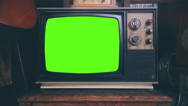 Changing Channels TV Green Screen Vintage Television. Old Television green screen changing channels in a vintage style technology