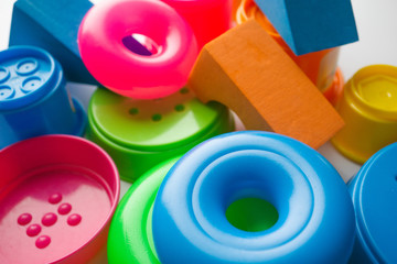 colored educational toys for babies, cubes, pyramids, cones, rings