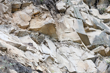 The sheer cliff of the rocky ridge of the mountainous region of the North Caucasus in Russia.