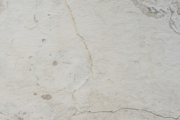 Wall fragment with scratches and cracks. It can be used as a background