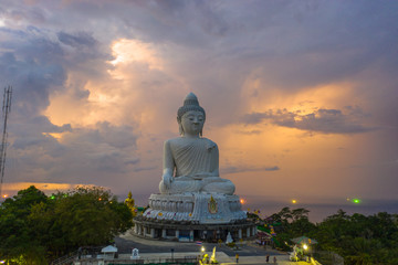 Fototapeta premium thunderstorm in sunset at Phuket big Buddha have beautiful color in the sky