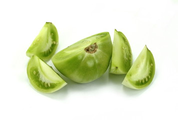 Green tomato on white background 