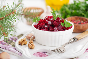 Healthy vegan beetroot salad with walnuts.