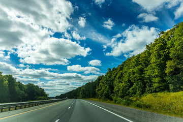 Lonesome road through a park in Ontario Canada