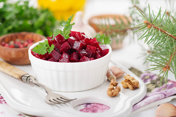 Healthy vegan beetroot salad with walnuts.