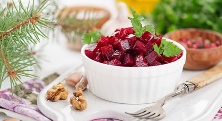 Healthy vegan beetroot salad with walnuts.