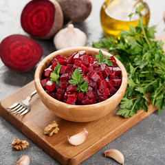 Healthy vegan beetroot salad with walnuts.