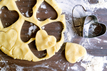 Cooking homemade cookies. the rolled out dough with a cookie cutter