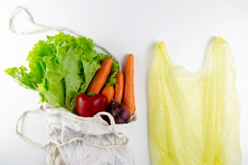 Zero waste concept. Vegetables in a woven bag. Woven bag vs plastic bags.