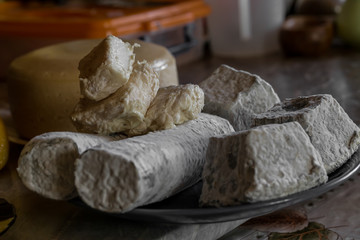 A set of blue cheese. Homemade cheese production. Dairy farm somewhere in Russia.