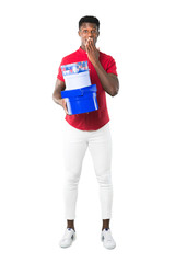 Full body of Young african american man surprised because has been given a gift on white background