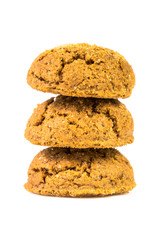 Pile of three pepernoten treats on white background
