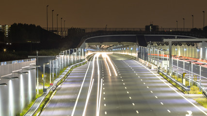 Motorway with tunnel entrance at night