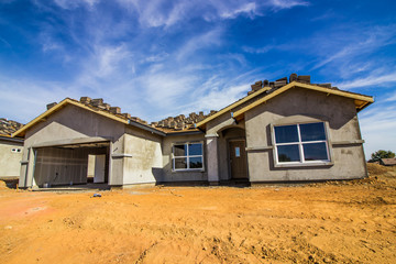 New Home Under Construction In Stucco Phase