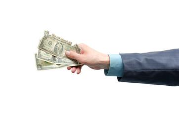 Businessman hand is holding a crumpled dollars money isolated on white background.