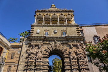 Obraz premium Monumental city gate of Palermo - Porta Nuova (1583 - 1669). Porta Nuova is located beside Palazzo dei Normanni (Palermo old royal palace). Palermo, Sicily, Italy.