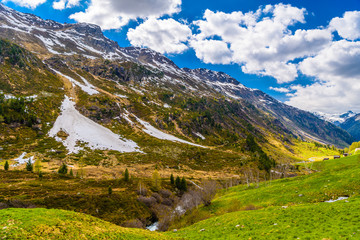 Fototapeta na wymiar Beautiful Alps mountains with clody sky, Fluelapass, Davos, Gra