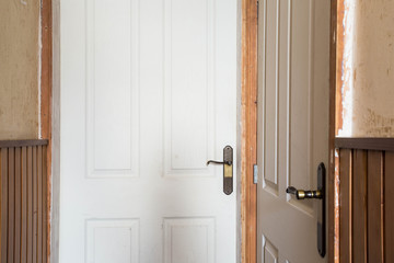 Obraz premium Close up of a old wooden door, renovate hallway vintage