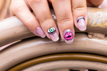 nail art manicure with colorful polish nails. Beauty hand and stylish nails.

